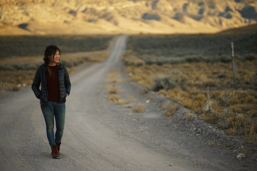 Dramatic scene man teenager walking road