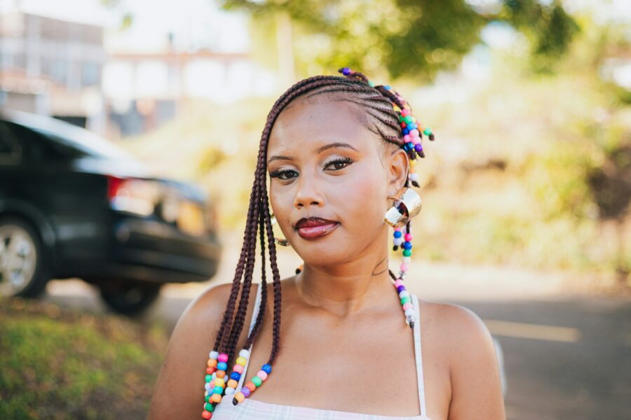 Teen girl box braids colorful beads street