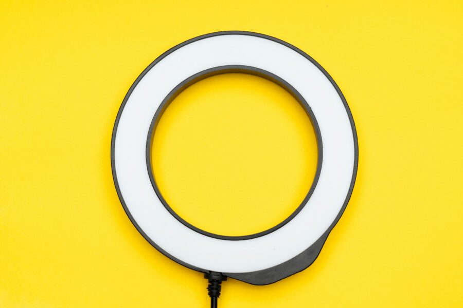 Influencer filming video smartphone ring light