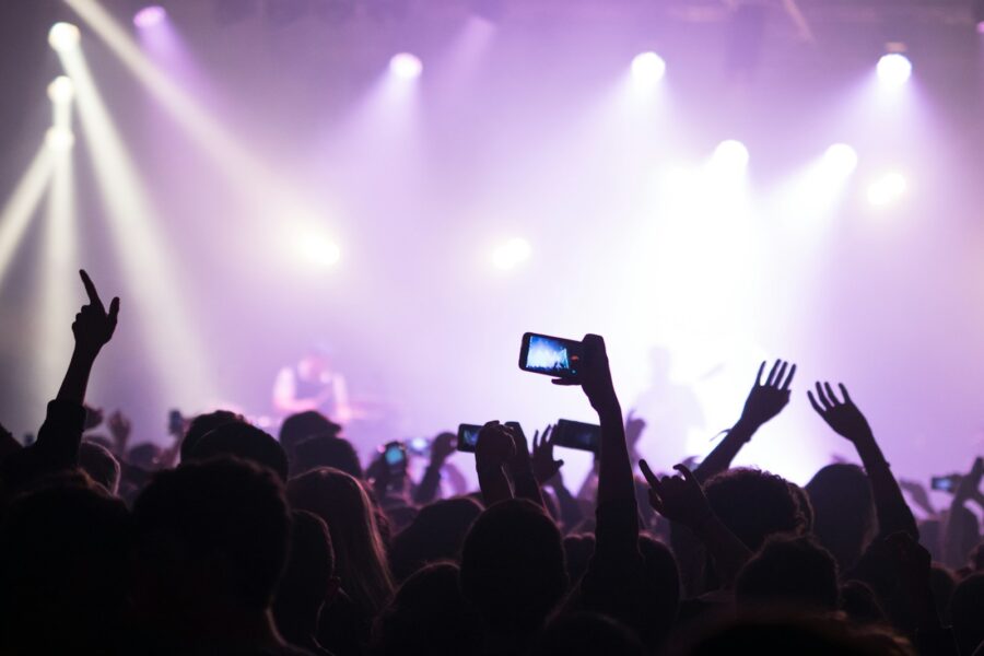 Concert crowd smartphone screens