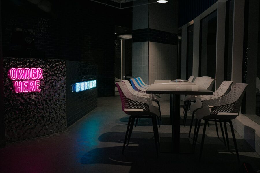 Gaming cafe interior pcs neon chairs