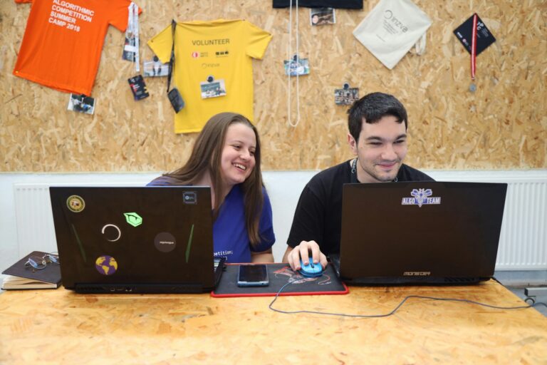 Teenagers laptops organizing charity online