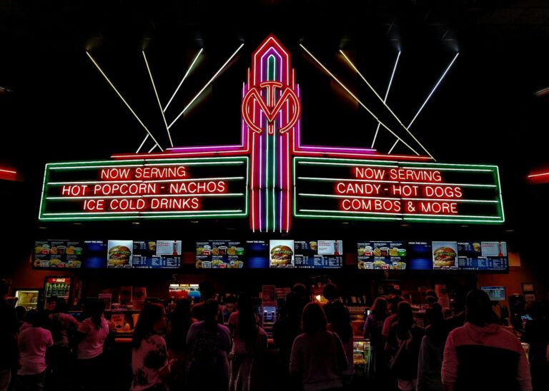 Midnight movie theater marquee people costume cinema