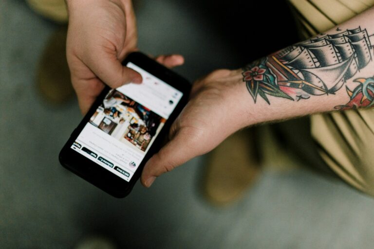 Person scrolling social media phone