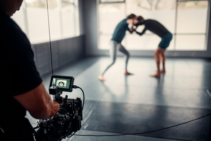 Young dancers filming tiktok routine studio