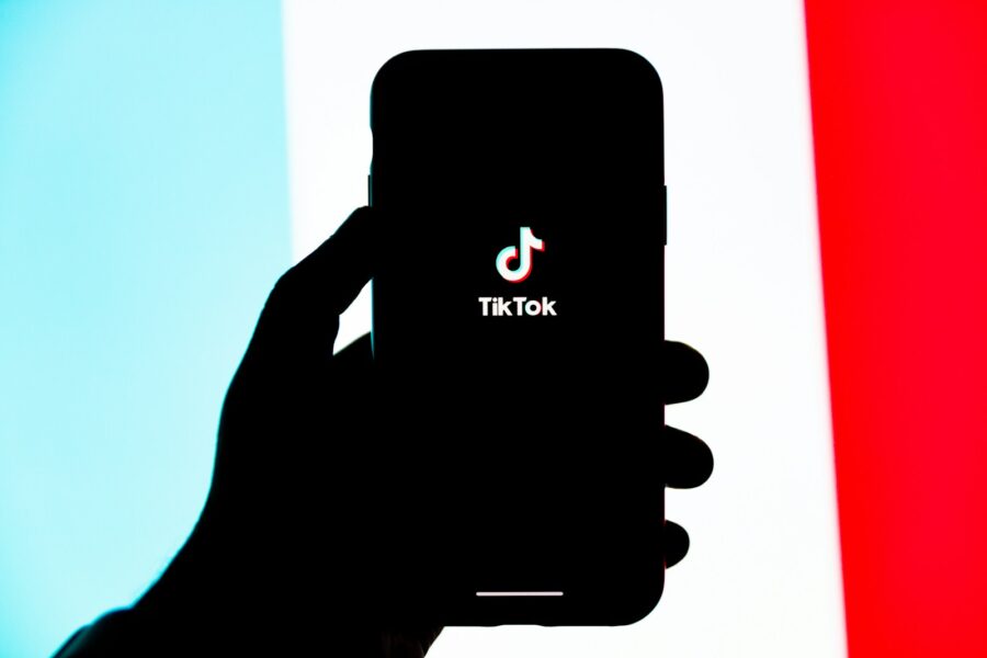 Tiktok app screen smartphone hands