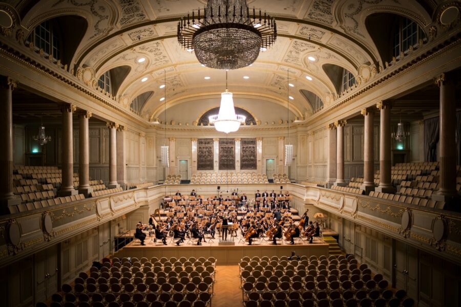 Symphony orchestra concert hall audience stage