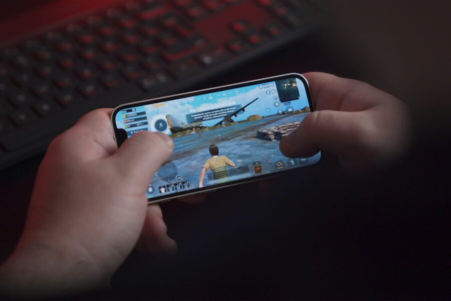 Mobile game smartphone hands couch