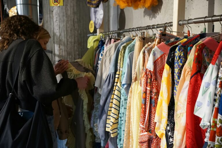 Thrift store clothing rack colorful garments