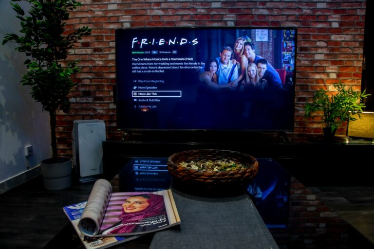 Friends listening podcast living room
