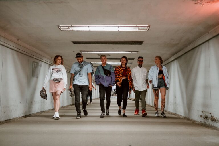 Athlete tunnel walk arena hallway streetwear outfit