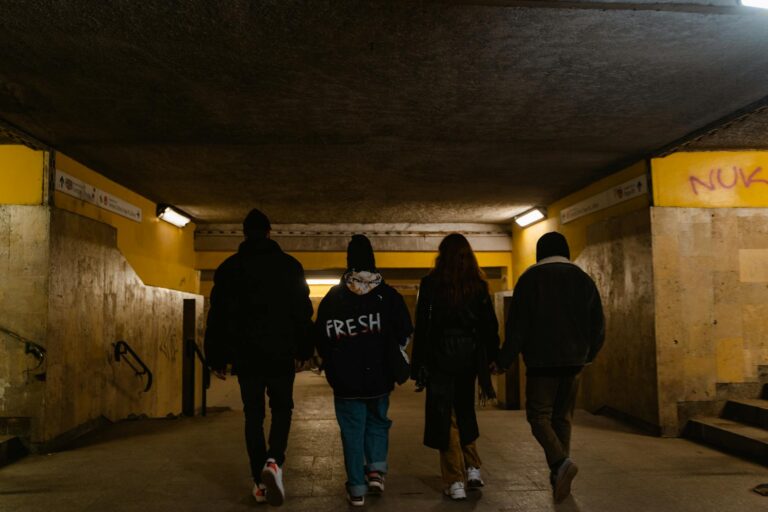Athlete tunnel walk arena hallway streetwear outfit detail