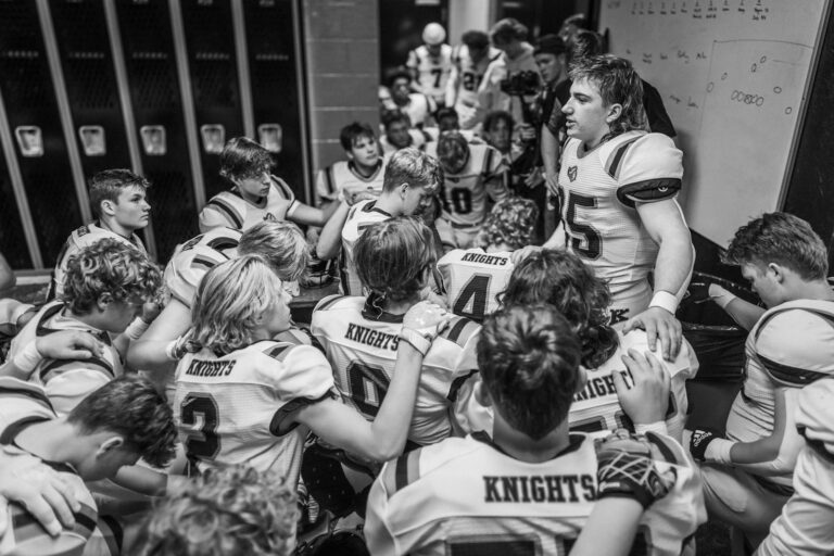 Sports documentary filming locker room camera crew