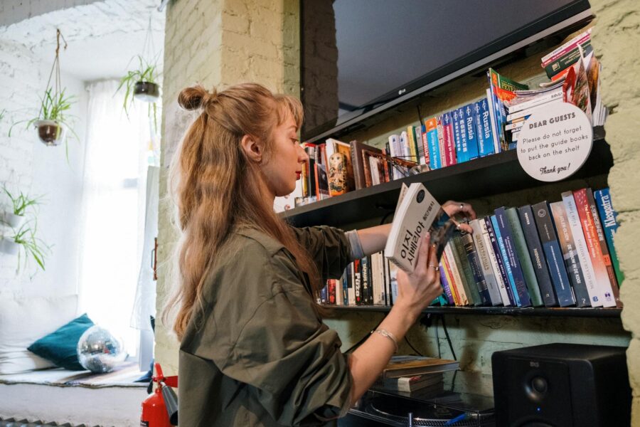 Person reading paperback