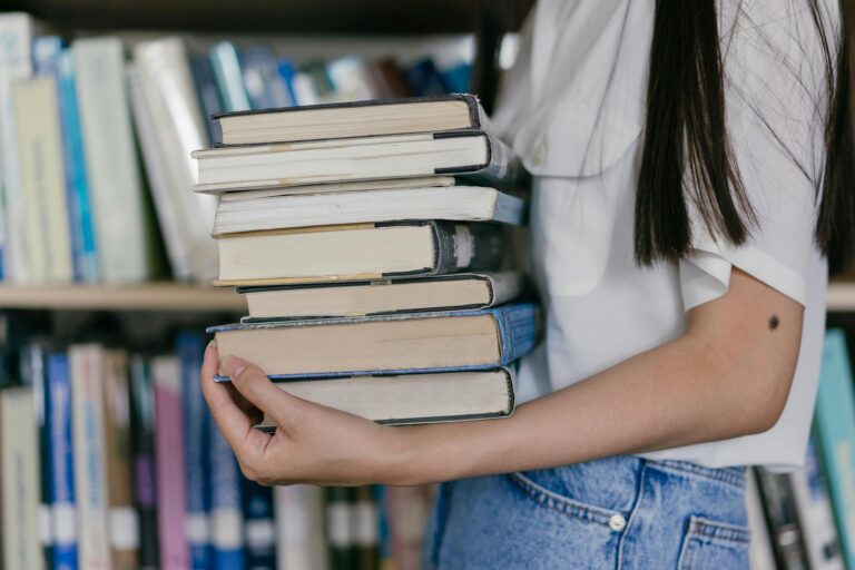 Person reading paperback