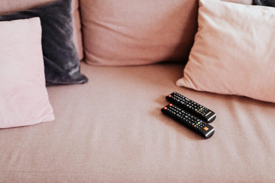 Cozy living room couch television remote