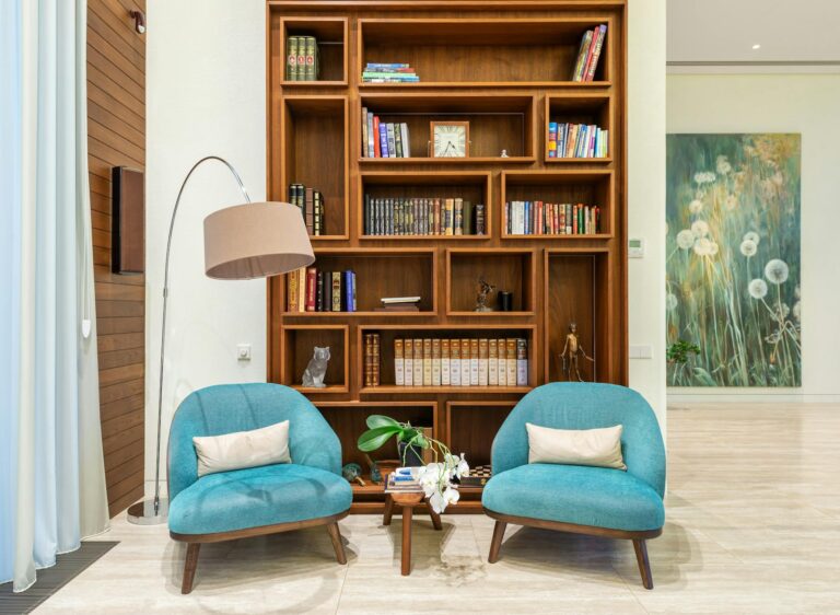 Cozy living room pop culture collectibles bookshelf detail
