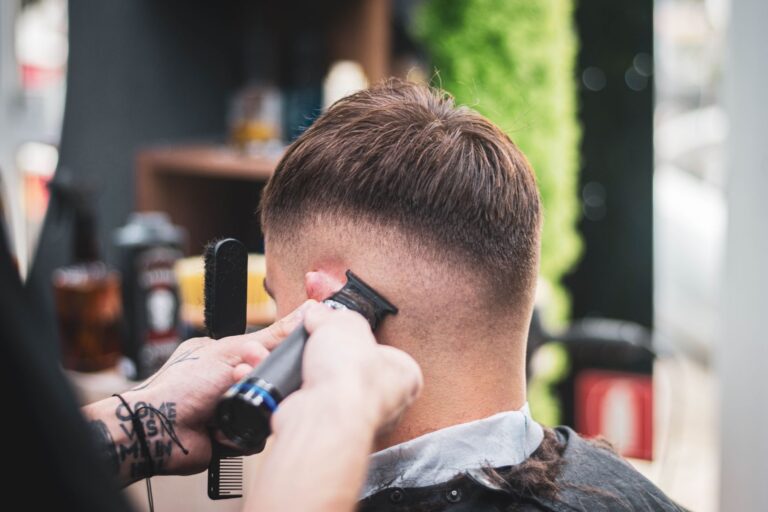 Barber cutting man