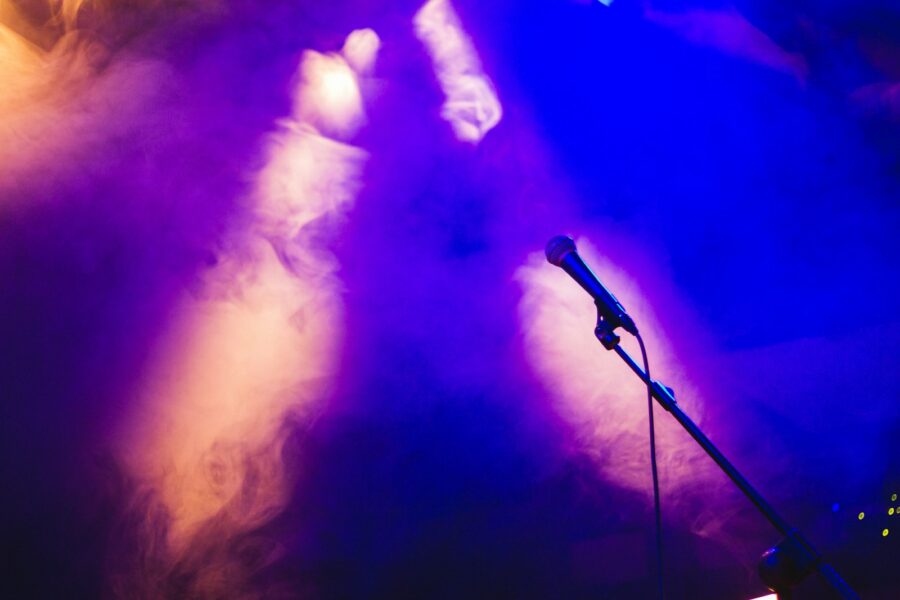 Singer stage purple