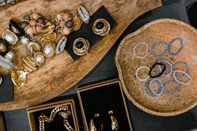 Vintage jewelry tray gold rings earrings woman tying