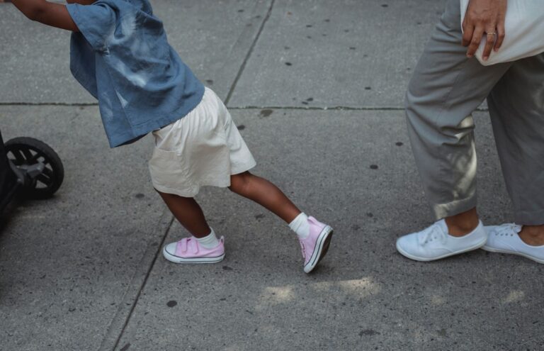 Father street style stroller sneakers city sidewalk