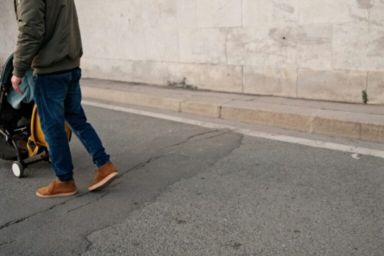 Stylish father walking stroller streetwear outfit