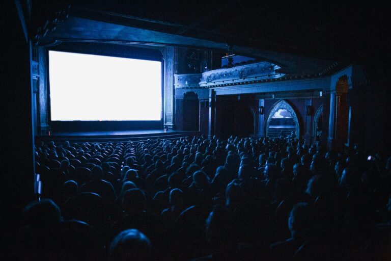 Concert film audience cinema screen stage lights