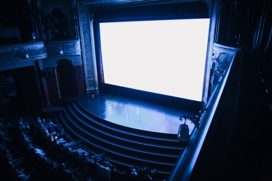 Concert film audience cinema screen stage lights